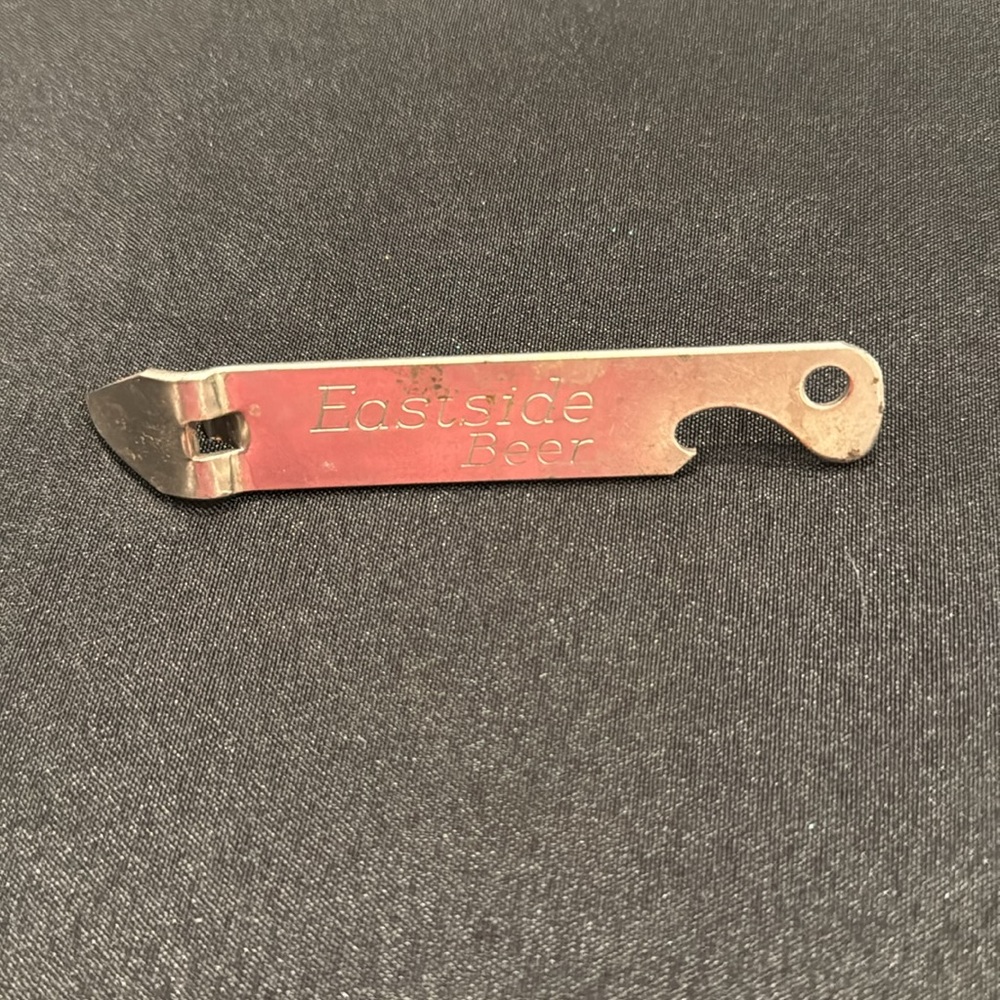 vintage beer bottle opener, likely
dating back to the mid-20th